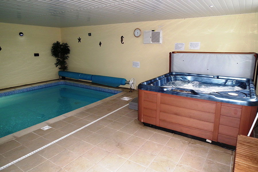 long barn pool with endless pool and hot tub